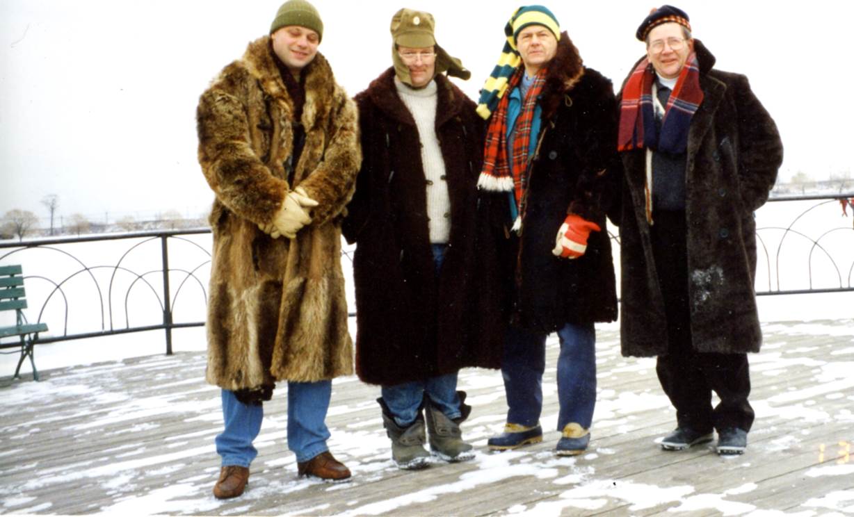 A group of people posing for the camera    Description automatically generated